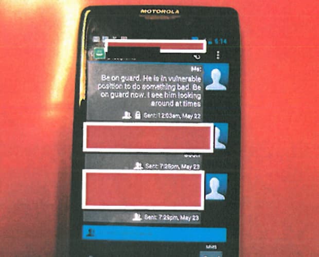 A text message sent by a state trooper, warning to "be on guard now," sent two minutes before Todashev was shot and killed. (Ashton report)