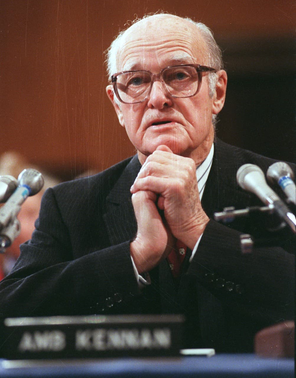 Amb. George F. Kennan, who gave the name "containment" to postwar foreign policy in a famous but anonymous article, testifies before the Senate Foreign Relations Committee in this Jan. 1990 photo. (AP)