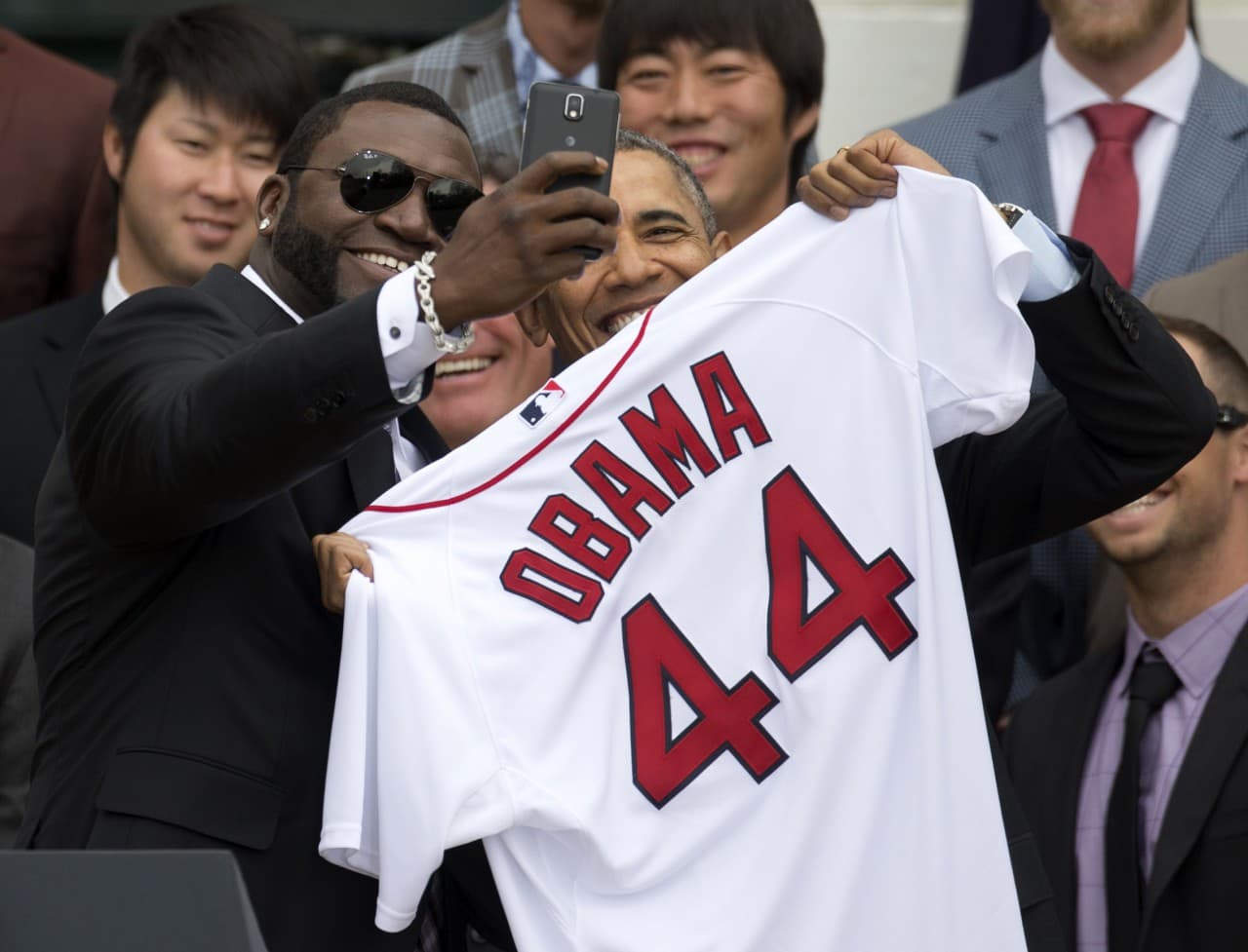 Boston Red Sox player David "Big Papi" Ortiz takes a selfie with President Barack Obama. (Carolyn Kaster/AP)