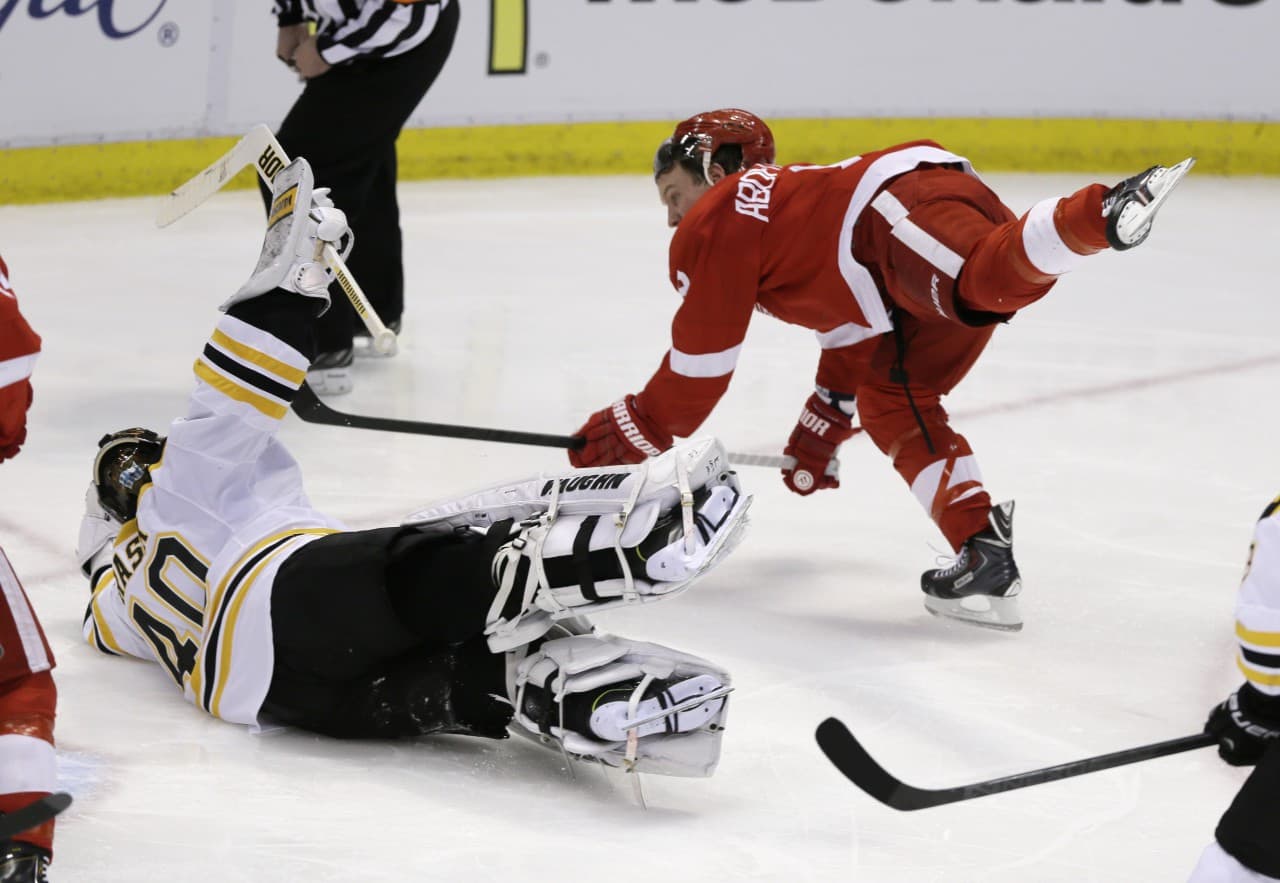 Boston Bruins goalie Tuukka Rask stops a shot by Detroit Red Wings left wing Justin Abdelkader, Tuesday, April 22, 2014. (Carlos Osorio/AP)