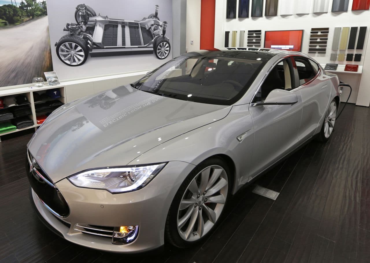 The Massachusetts State Auto Dealers Association wants to block the way California electric-car maker Tesla sells its automobiles. (Al Behrman/AP)