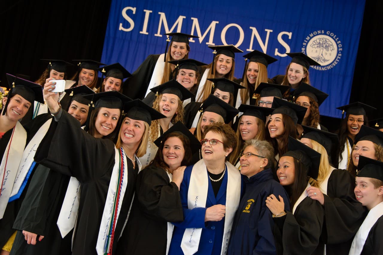 Billie Jean King poses with Simmons student athletes. (John Gillooly/PEI Photography)