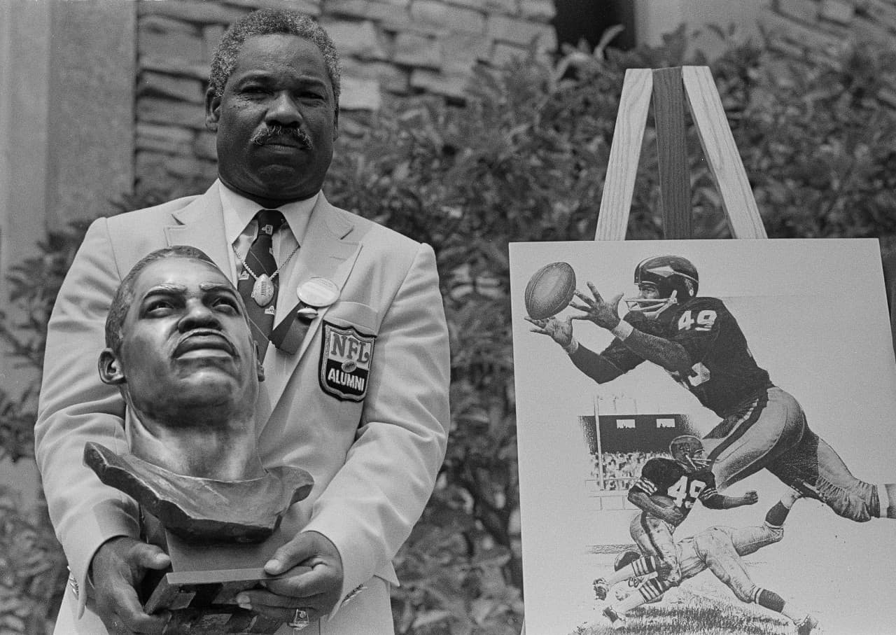 After breaking in with Cleveland, Bobby Mitchell became the Washington Redskins' first black player in 1962. The halfback and wide receiver was inducted into the Pro Football Hall of Fame in 1983. (Gus Chan/AP)
