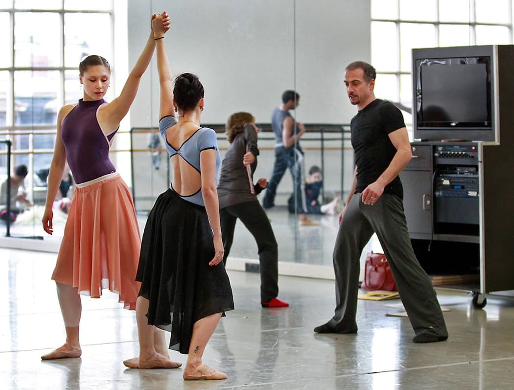 Petr Zuska instructs Lauren Herfindahl and Dalay Parrondo in a rehearsal for his “D.M.J. 1953-1977” (Lawrence Elizabeth Knox)