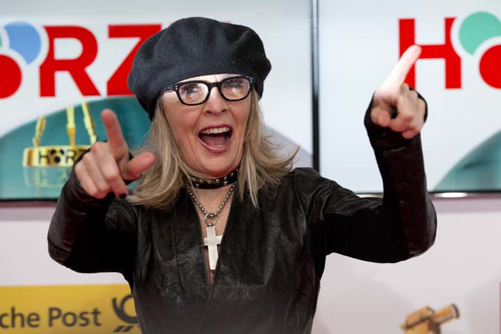 US actress Diane Keaton, gestures, as she arrives on the red carpet for the Goldene Kamera (Golden Camera) media awards in Berlin, Germany, Saturday, Feb. 1, 2014.  (AP)