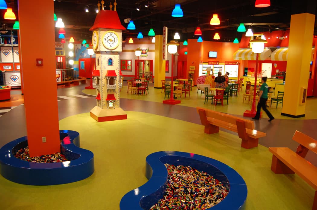 A clock tower and café at the center of the Legoland’s central hall. (Greg Cook)