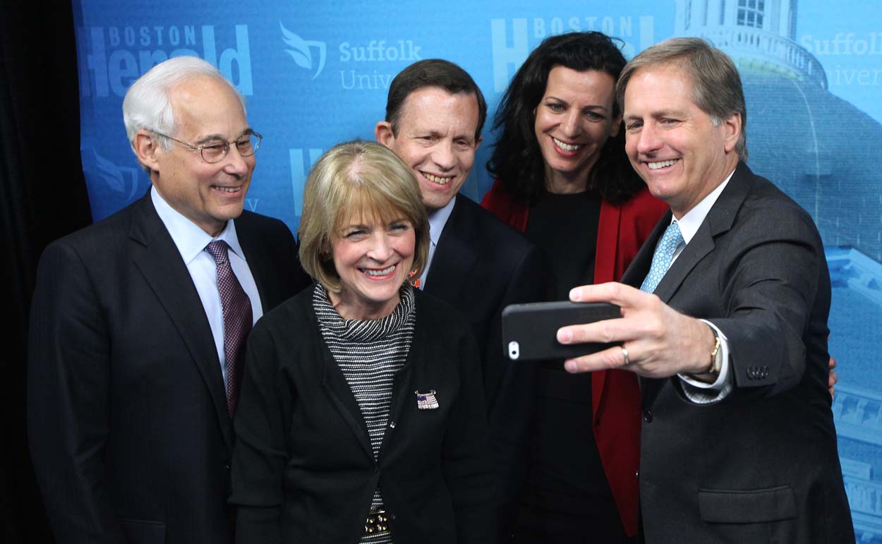 Massachusetts Democratic gubernatorial hopefuls take a group selfie following a debate at Suffolk University Tuesday. From left Don Berwick, Martha Coakley, Steve Grossman, Juliette Kayyem and Joseph Avellone. (Matt Stone/The Boston Herald/AP/Pool)
