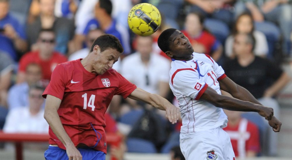 Jeffrey Holt: Every artful touch of the ball, exquisite pass, explosive burst of speed and thundering shot on goal, begins in the cortex of evolution’s greatest achievement: the human brain. In this photo, Serbia's Nemanja Matic (14) goes up for a header against Panama's Armando Cooper (11) during the first half of an international friendly soccer game in Bridgeview, Ill., Saturday, May 31, 2014. (Paul Beaty/AP)