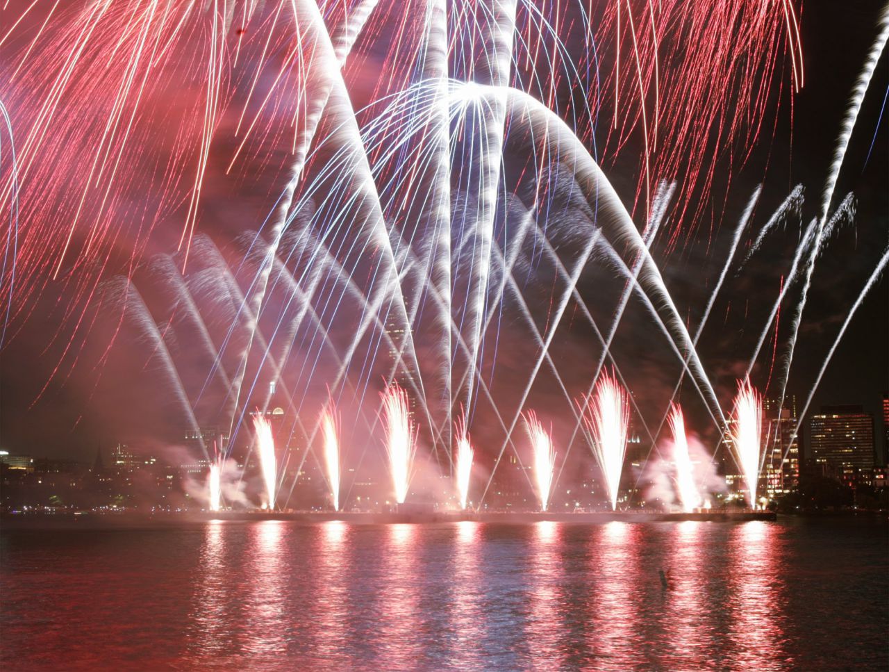 Fireworks light up the sky against the Boston skyline, as seen from Cambridge side of the Charles River, Sunday, July 4, 2004. (Chitose Suzuki/AP)