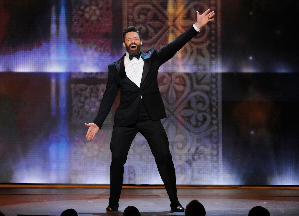 Host Hugh Jackman performs on stage at the 68th annual Tony Awards at Radio City Music Hall on Sunday, June 8, 2014, in New York. (Evan Agostini/Invision/AP)