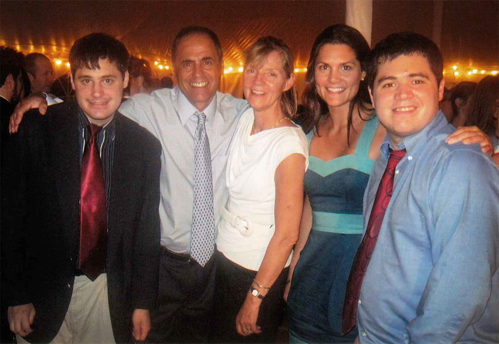 The Moscariello family (Michael is at left, Jonathan is at right) at the wedding of Brian Gordon, Jonathan's mentor (Courtesy)