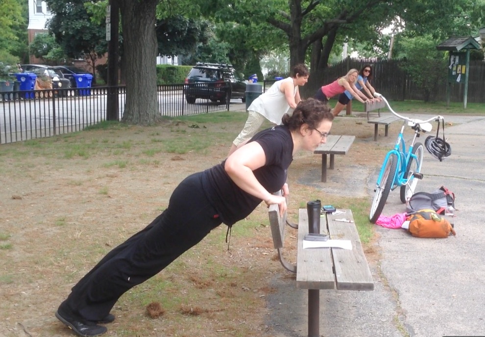 Kat and the models -- all of them, oddly enough, named Beth, demonstrate an incline pushup on a bench.