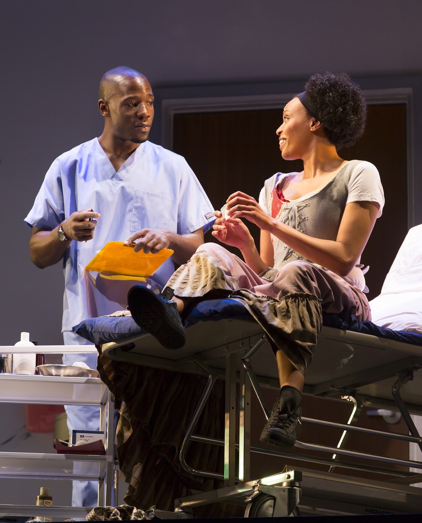 McKinley Belcher III providing stitches -- and repartee -- for Miranda Craigwell in "Smart People." (T. Charles Erickson)