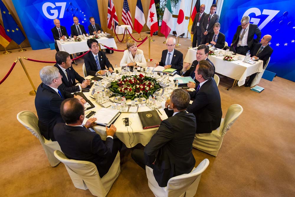 Group of 7 leaders from front center right clockwise, U.S. President Barack Obama, French President Francois Hollande, Canadian Prime Minister Stephen Harper, Italian Prime Minister Matteo Renzi, Japanese Prime Minister Shinzo Abe, German Chancellor Angela Merkel, European Council President Herman Van Rompuy, European Commission President Jose Manuel Barroso and British Prime Minister David Cameron a G7 summit at the EU Council building in Brussels on Thursday, June 5, 2014. (AP)