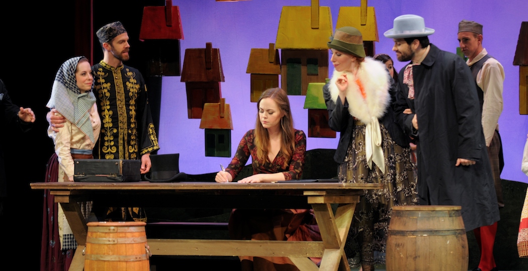 Nicole Percifield (in center at table) is Marenka in Boston Midsummer Opera’s 2014 production, The Bartered Bride