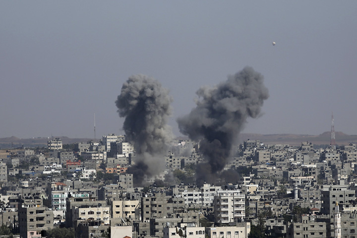 Smoke rises after an Israeli strike in Gaza City, Tuesday, July 8, 2014. The Israeli military launched what could be a long-term offensive against the Hamas-ruled Gaza Strip on Tuesday striking nearly 100 sites in Gaza and mobilizing troops for a possible ground invasion aimed at stopping a heavy barrage of rocket attacks against Israel. (AP)