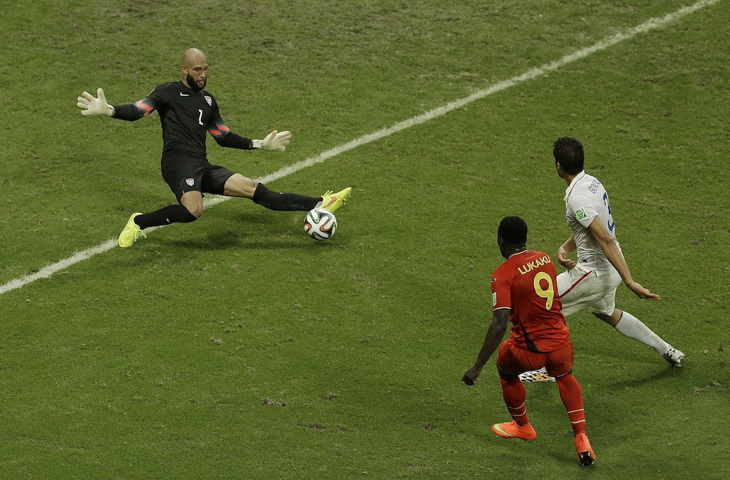 Tim Howard making a save in the loss against Belgium. (Themba Hadebe/AP)