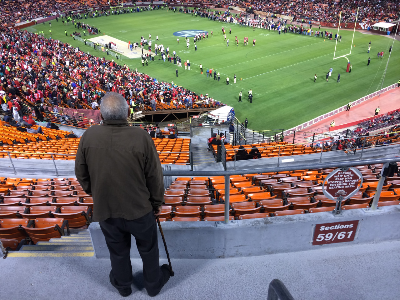 49ers fan John Barberini takes in second-half action during last week's "Legends of Candlestick" flag football game. (Dan Brekke)