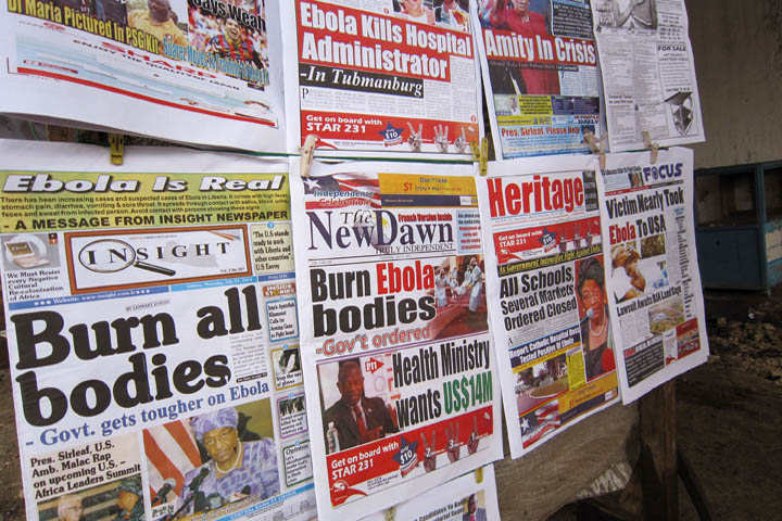 A close up of newspaper front pages focusing on the Ebola outbreak, including a newspaper, left, reading 'Burn all bodies' in the city of Monrovia, Liberia, Thursday, July 31, 2014. The worst recorded Ebola outbreak in history surpassed 700 deaths in West Africa. (AP)