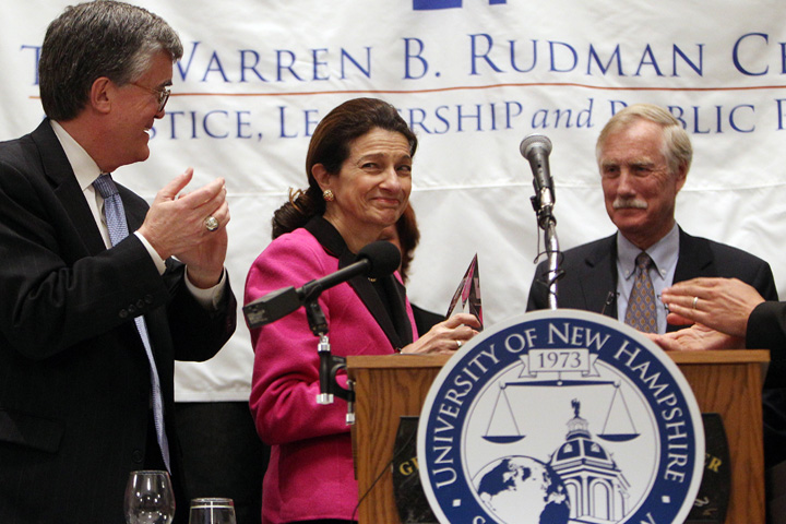 Dean of the University of New Hampshire School of Law, John Broderick, left, watches as former U.S. Sen. Olympia Snowe, center, is introduced of U.S. Sen. Angus King, right, Sunday, April 21, 2013 in Concord, N.H. Snowe received the inaugural Warren B. Rudman award at a dedication ceremony for the former New Hampshire U.S. senator. (AP)