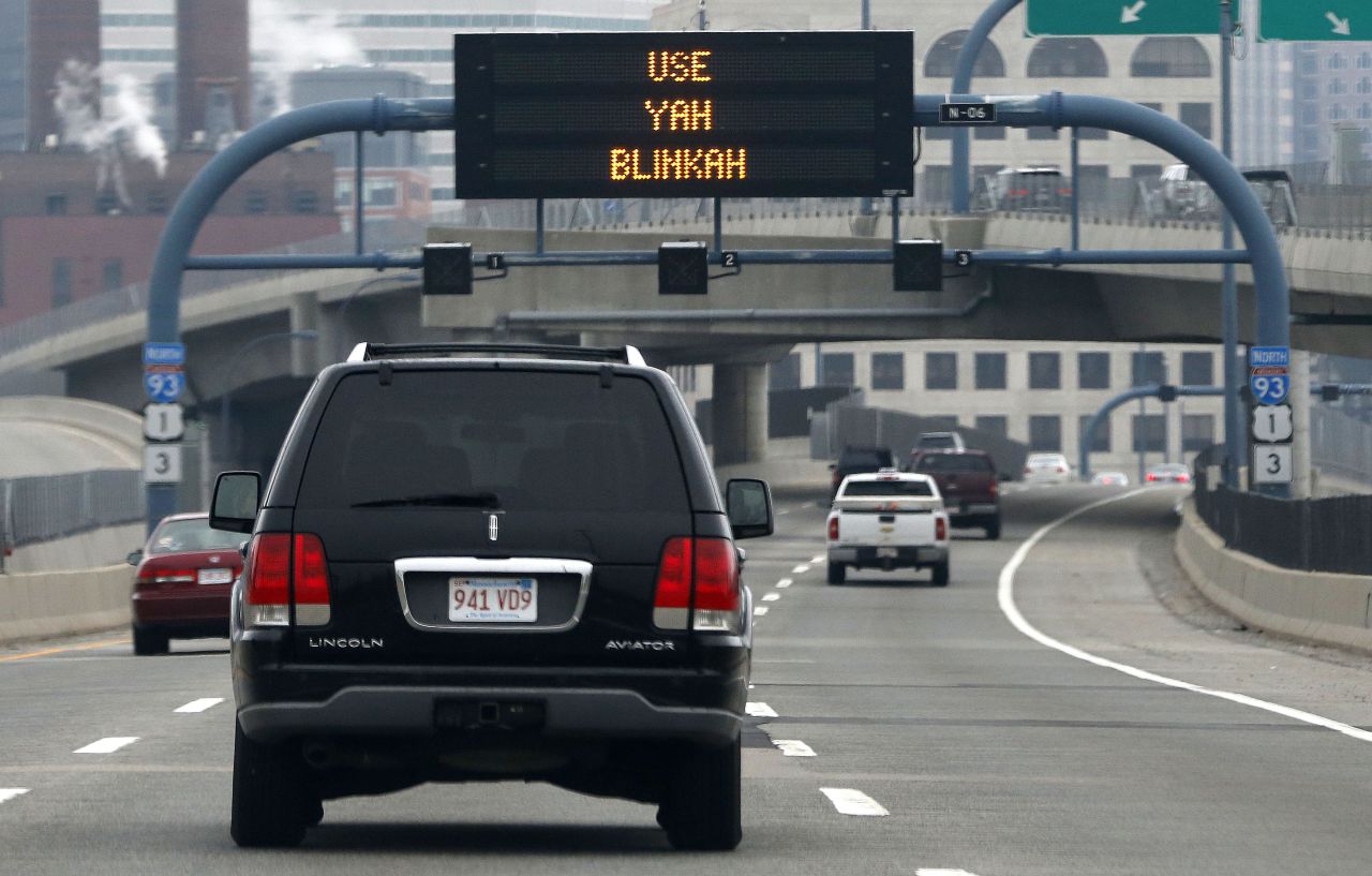 An electronic highway sign is seen on Interstate 93 in Boston last May. (Michael Dwyer/AP)