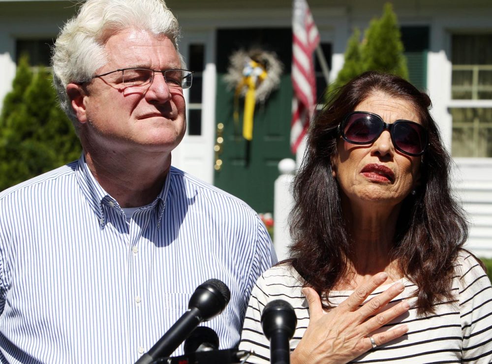 Diane and John Foley talk to reporters Wednesday outside their home in Rochester, New Hampshire. (Jim Cole/AP)