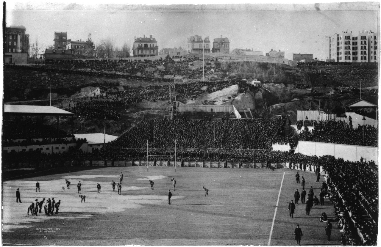 With 50,000 fans watching, Princeton's Phil King places the ball at midfield to begin the 1893 game against Yale. The Tigers are aligned in a flying wedge. (Courtesy of Manuscripts and Archives, Yale University Library)