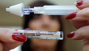 A tube of Naloxone Hydrochloride, also known as Narcan, is held up in 2012. Narcan is a drug used to counter the effects of opiate overdose. (Charles Krupa/AP)
