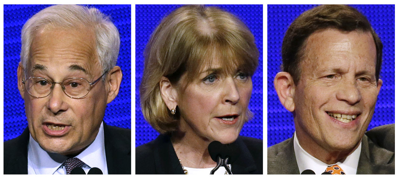 Massachusetts Democratic gubernatorial hopefuls, from left, Don Berwick, Martha Coakley and Steve Grossman at the state Democratic Convention in Worcester, Mass. in June. (Stephan Savoia/AP, file)