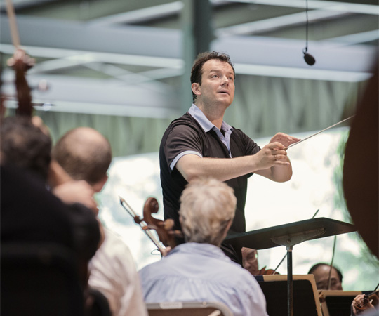 Andris Nelsons directs a Boston Symphony Orchestra rehearsal at Tanglewood in July. (Courtesy Marco Borggreve/BSO)