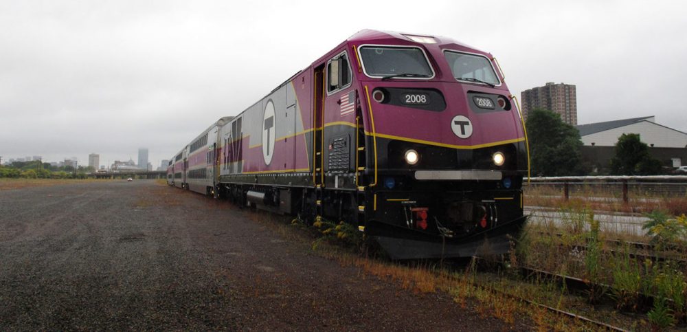 A new commuter rail train was parked in the Beacon Park Rail Yard  in Allston. Governor Patrick announced on September 30, 2014 that a new MBTA commuter rail station will be built in the area. (Zeninjor Enwemeka/WBUR)
