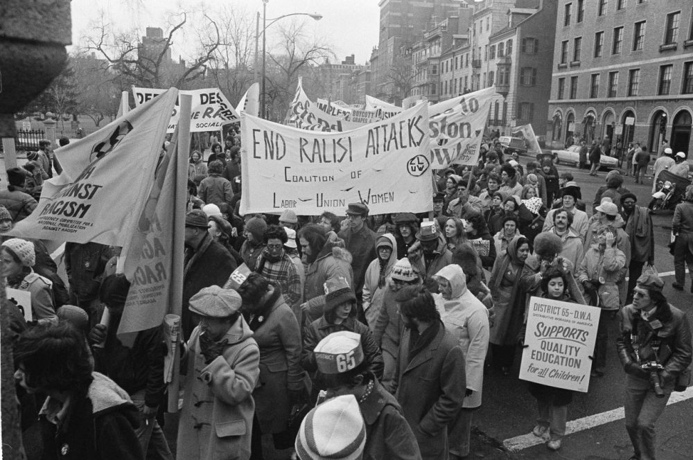 Part of a crowd of seven thousand enter Boston Common for pro-busing rally, Dec. 14, 1974. The rally heard speeches by black leaders including the Rev. Ralph Abernathy. (AP)