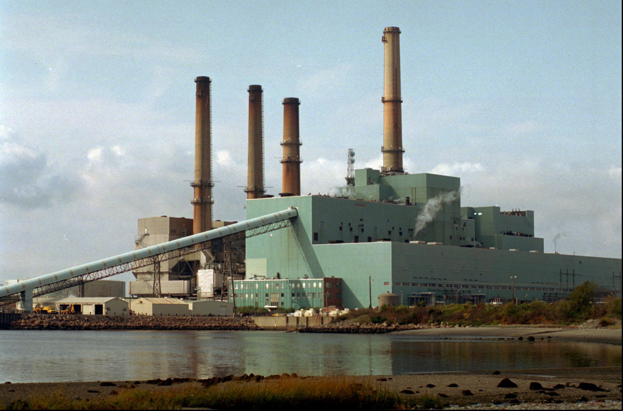 The Brayton Point Power Station in Somerset, Mass., is shown in this Wednesday, Oct. 23, 1996 file photo. National Energy & Gas Transmission Inc., the company that owns the Brayton Point power plant, is appealing an order from the Environmental Protection Agency on water the plant takes in and releases back into Mount Hope Bay. "We regret that there is no choice but to challenge some of the conclusions and requirements of the EPA permit for Brayton Point," the company's spokeswoman, Natalie Wymer, said Wednesday, Nov. 5, 2003. (AP)