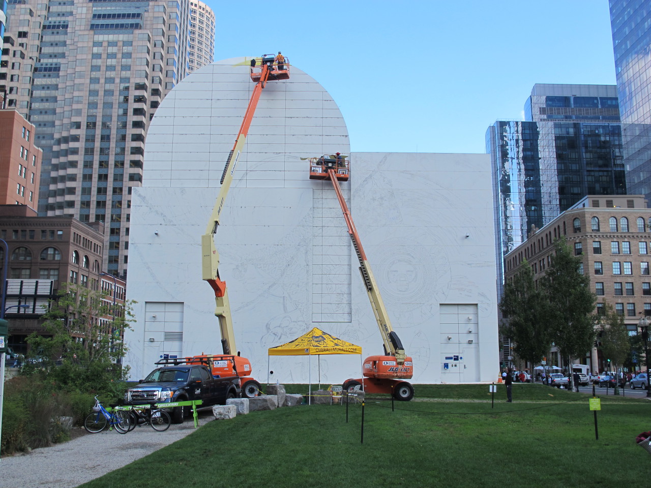 Construction on the new Dewey Street mural. (Andrea Shea/WBUR)
