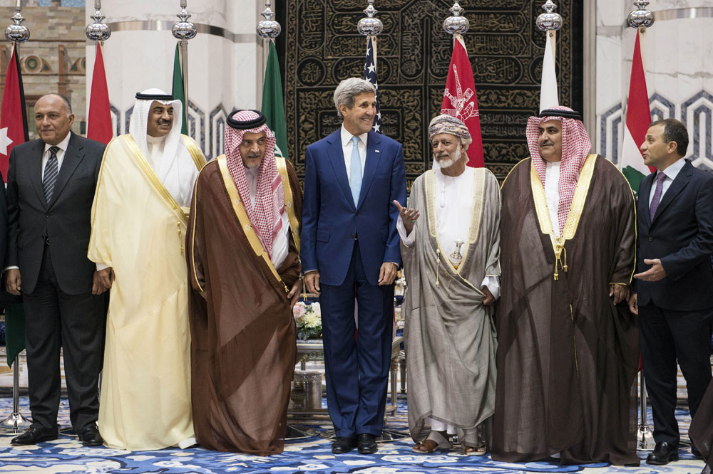 In this Thursday, Sep. 11, 2014 photo, John Kerry and Middle Eastern foreign ministers stand together during a family photo with of the Gulf Cooperation Council and regional partners at King Abdulaziz International Airport’s Royal Terminal in Jiddah, Saudi Arabia. (AP/Brendan Smialowski, Pool)