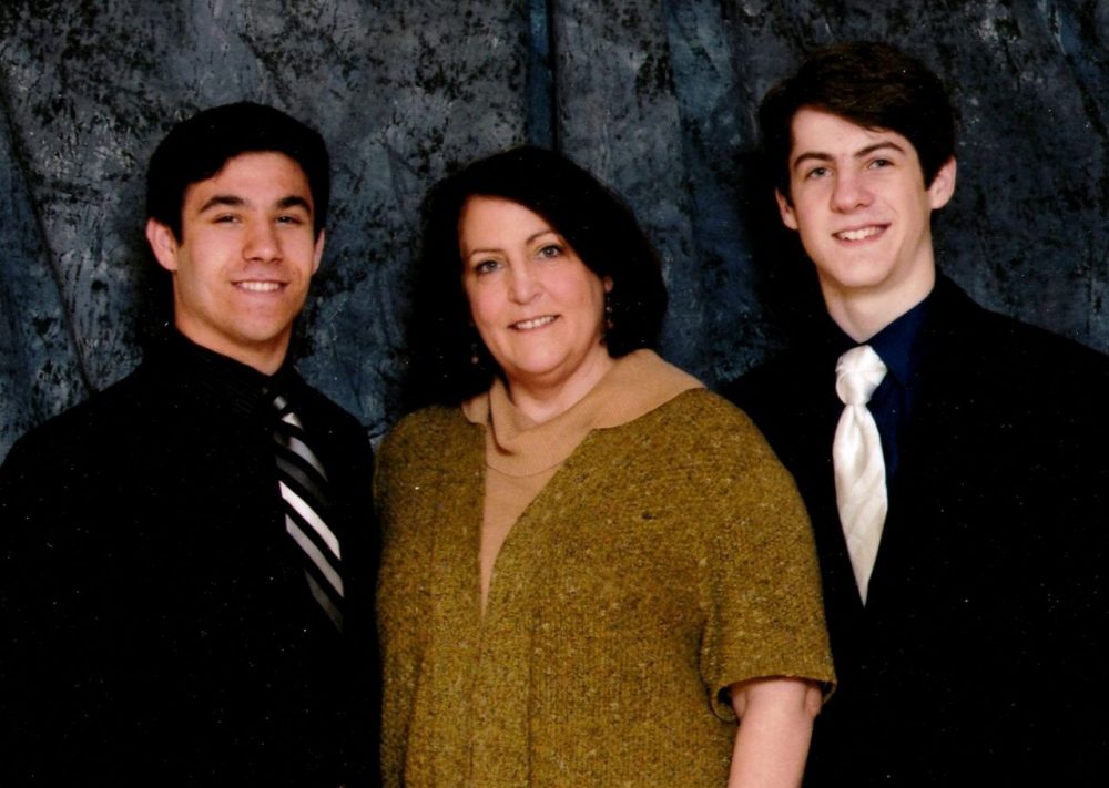 From left - Michael Tambone, Frances Schmitz, and Vincent Schmitz pose at the 2013 Mother/Son Mass. (Courtesy)