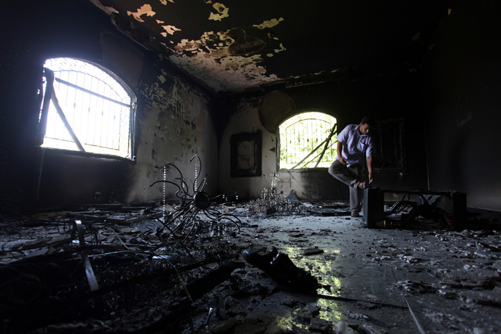 This Sept. 13, 2012 file photo shows a Libyan man investigating the inside of the U.S. consulate in Benghazi, Libya, after a deadly attack two days earlier. (AP)