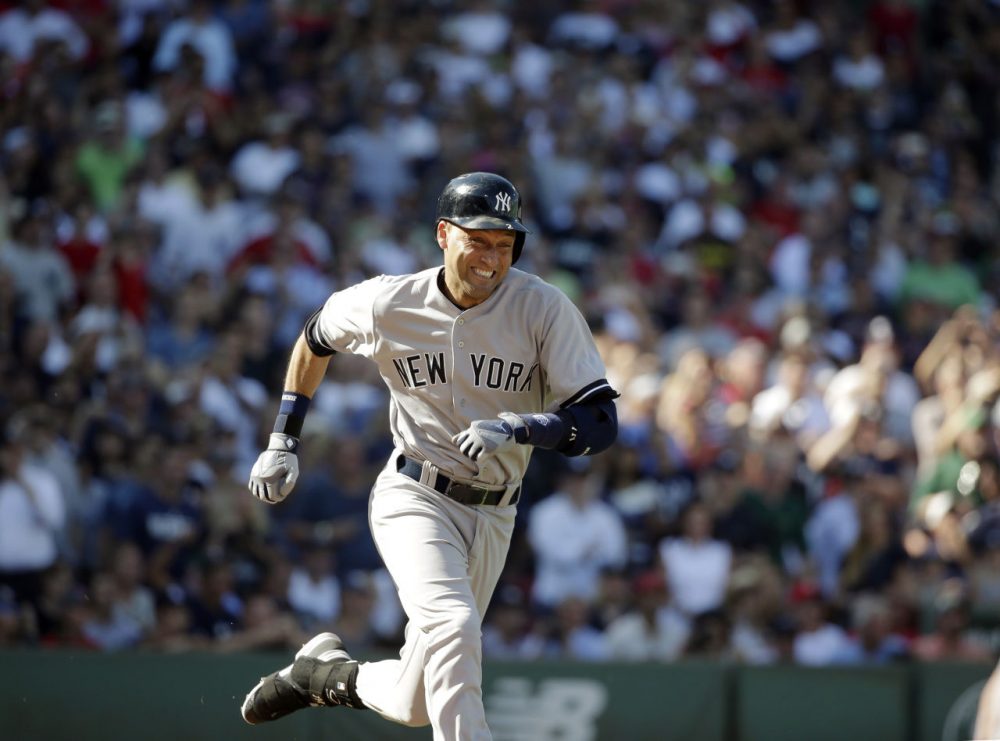 New York Yankees designated hitter Derek Jeter legs out an infield hit against the Boston Red Sox, driving in Ichiro Suzuki, during the third inning of a baseball game Sunday at Fenway Park. This was the last at-bat in Jeter's baseball career. (Steven Senne/AP)