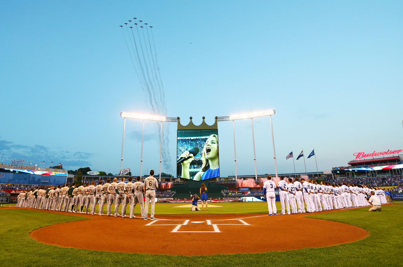 Pre-game ceremonies were in full swing for the Royals' first postseason game in 29 years on Sept. 30. (Dilip Vishwanat/Getty Images)