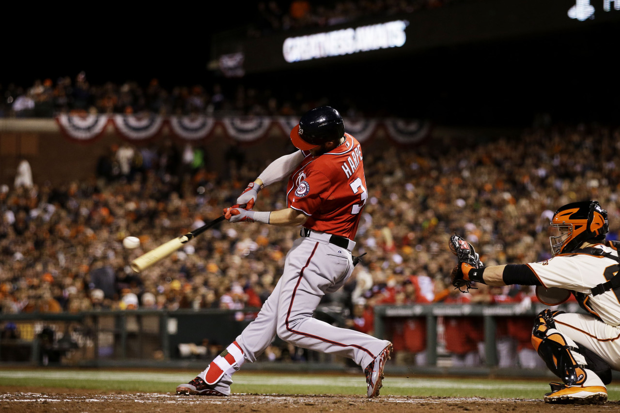 Bryce Harper smacked a solo home run in Game 4, but his Nationals still fell to the Giants in the NLDS. (Ezra Shaw/Getty Images)