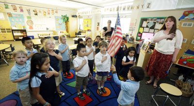 A Child Recites The Pledge Of Allegiance. A Mother Struggles To Explain It.