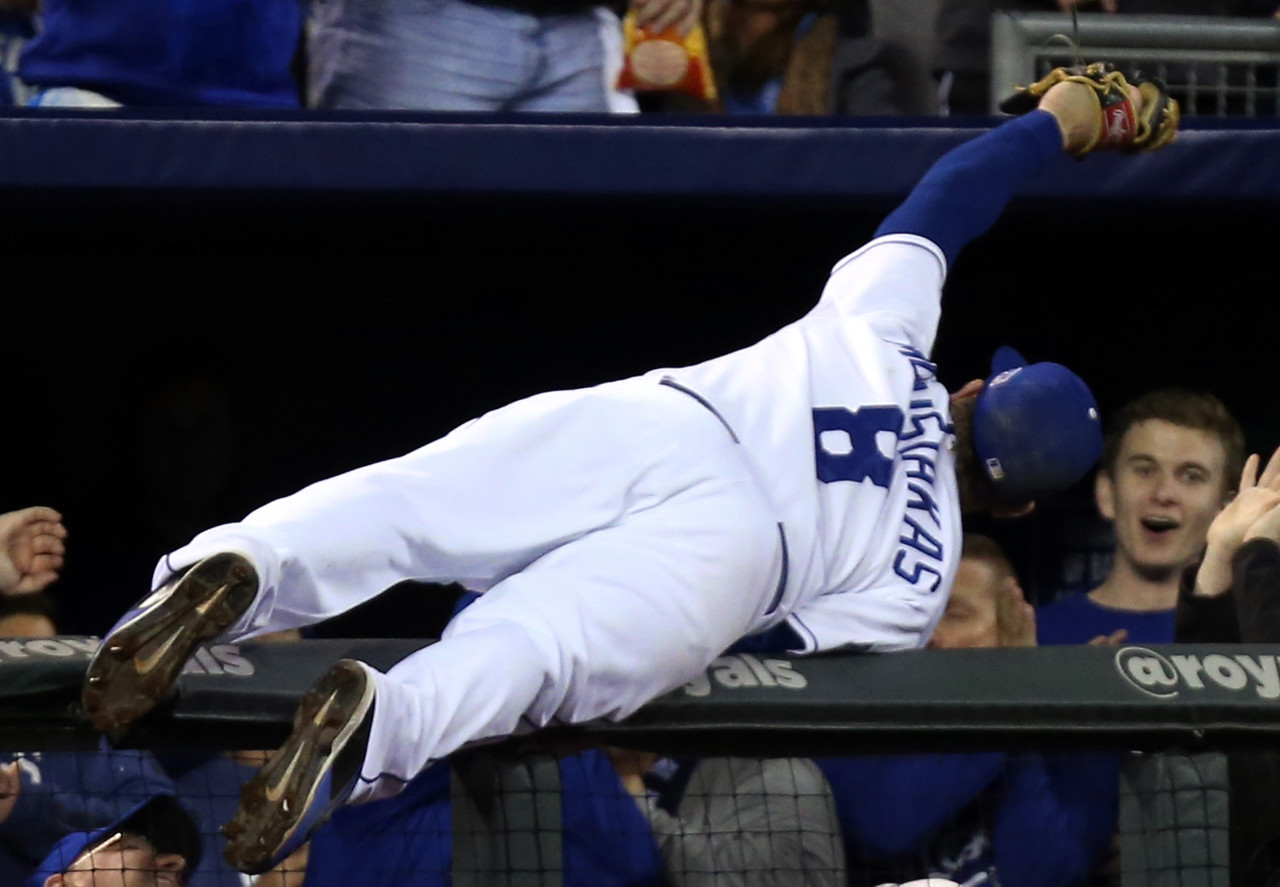 Mike Moustakas' highlight-reel catch helped the Royals take game three of the ALCS. (Ed Zurga/Getty Images)