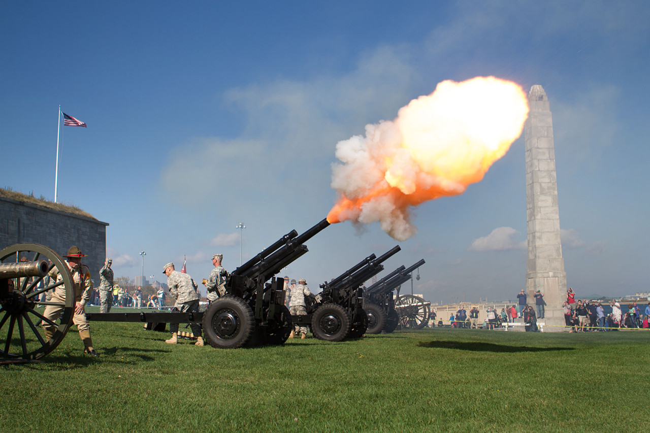 A cannon fires off from Castle Island. (Jesse Costa/WBUR)