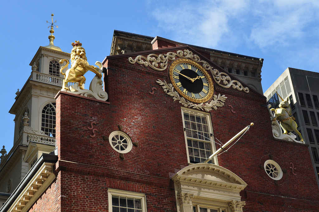The lion and unicorn statues in their usual spot on the top of the Old State House. (kestrana/Flickr)