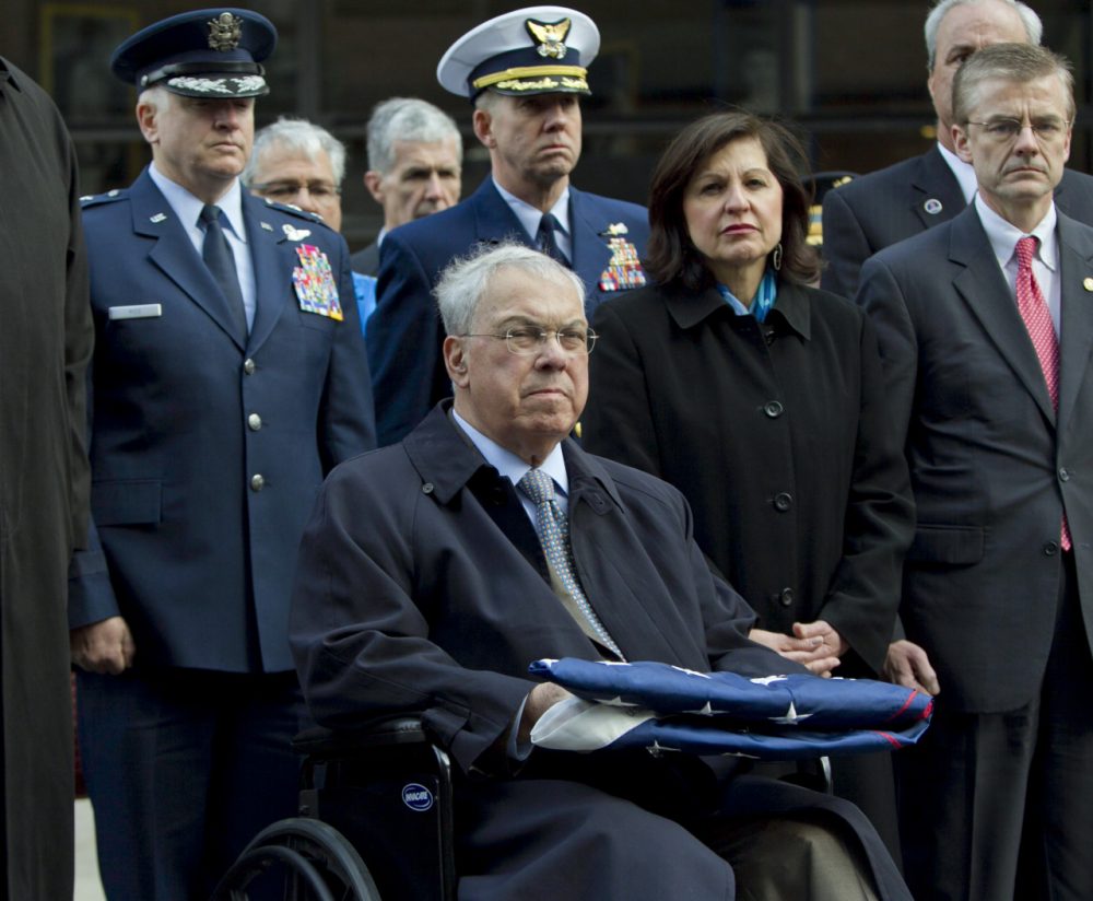 Menino. seated, recovering from a broken leg, U.S. Attorney Carmen Ortiz, second from right, and Special Agent in Charge of the FBI's Boston Field Office Richard DesLauriers, right, participate at a ceremony at the Boston Marathon blast site on Boylston Street on April 22, 2013. (Robert F. Bukaty/AP)