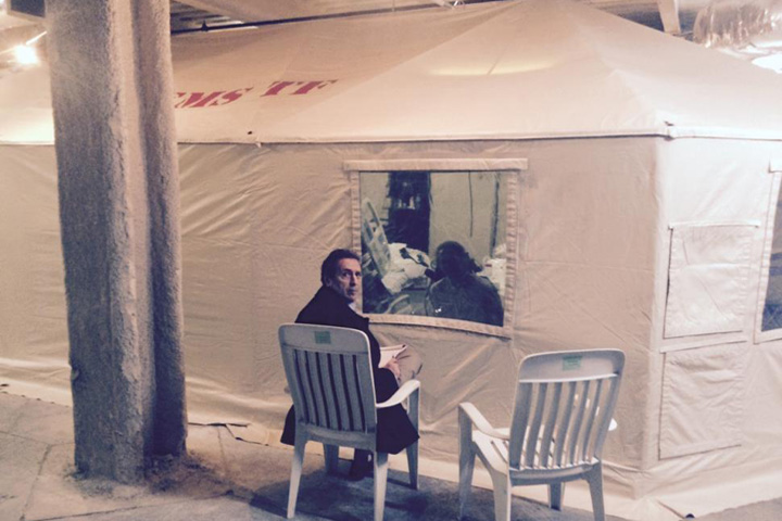 Kaci Hickox (R) speaks with civil rights attorney Norman Siegel from within her mandatory quarantine tent in Newark, NJ. (Steven Hyman) 