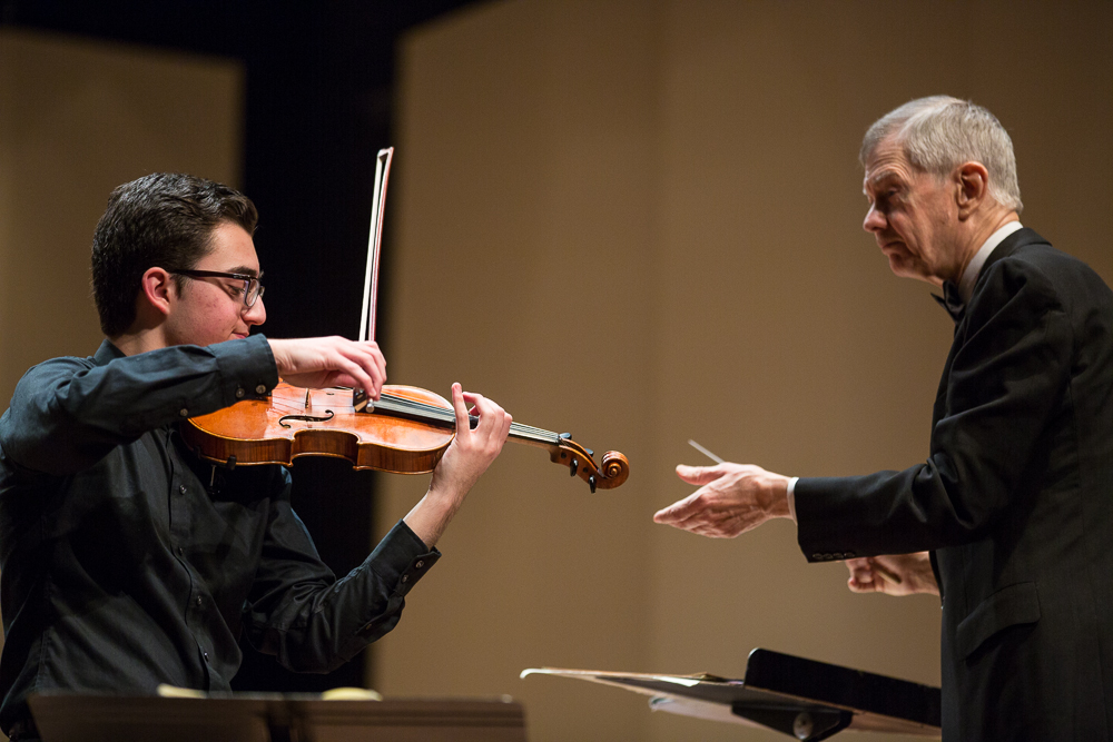 Richard Pittman with violinist Sammy Andonian, the Philharmonic's 2013 Young Artist Competition winner. (Robert Torres)