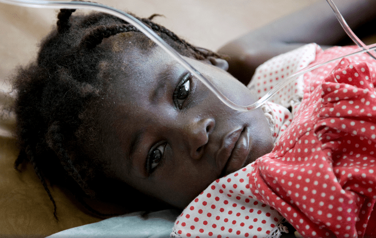 Francina Devariste, 3 years old, is one victim of an ongoing cholera outbreak in Haiti that has killed 8,000 people and sickened over 700,000. (2010 photo courtesy of the United Nations)