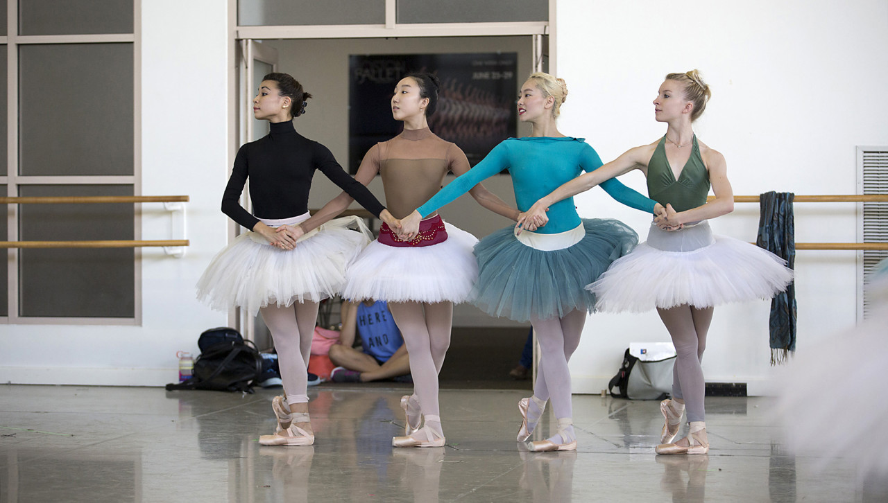 From left, Brett Fukuda, Ji Young Chae, Seo Hye Han, and Shelby Elsbree dance in harmony as the “Four Little Swans” during a costume run-through of "Swan Lake" at the Boston Ballet studios. (Lawrence Elizabeth Knox)