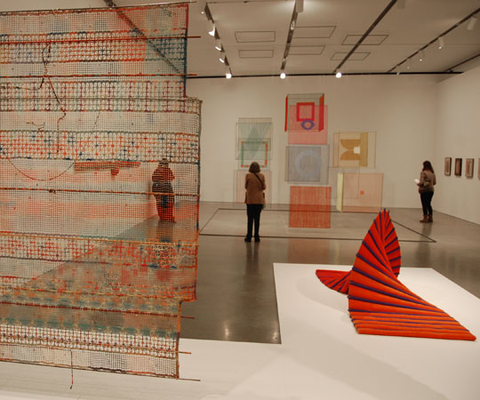 From left, Alan Shields's 1971 "Nina Got It for 100 Francs"; Elsi Giauque's 1979 "Spacial Element"; and Jean Stamsta's c. 1970 "Orange Twist." (Greg Cook)